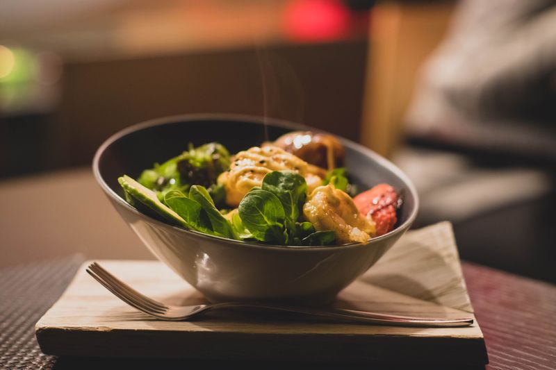 Fresh salad bowl with vegetables and starbird chicken
